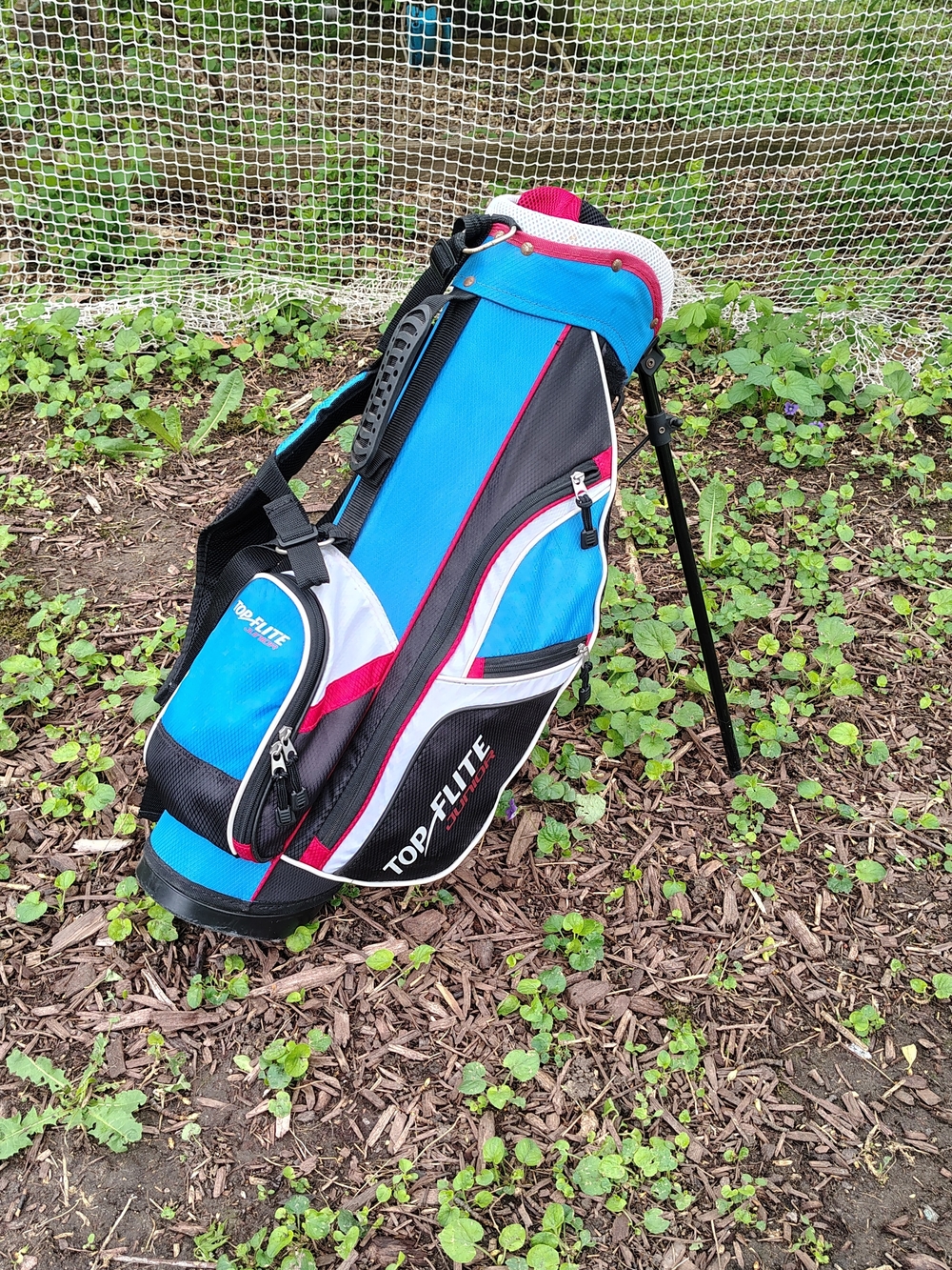 Top-Flite Junior Stand Golf Bag in Blue, Black, Red, And White Shoulder Straps